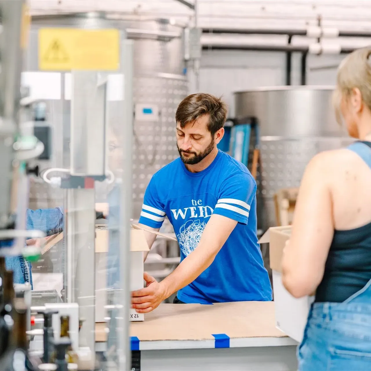 Person bottling Chateau Tumbleweed wine