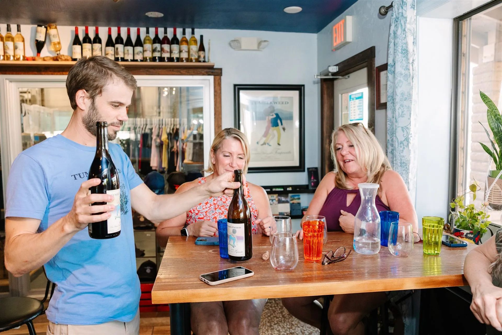 People enjoying a wine tasting at Chateau Tumbleweed